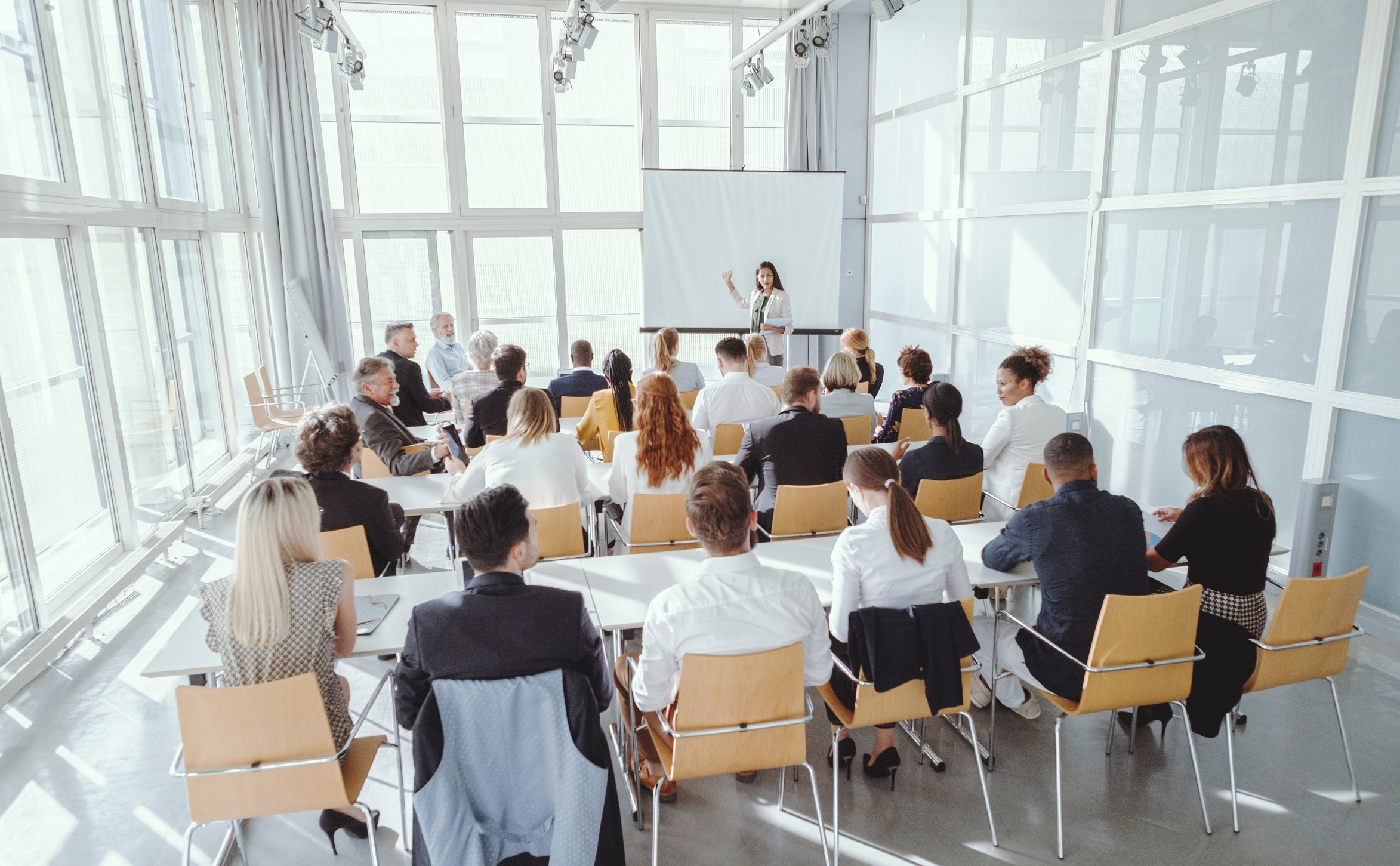 Indian businesswoman leading the seminar